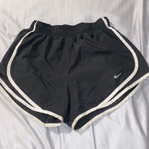 Grey and white Nike athletic shorts